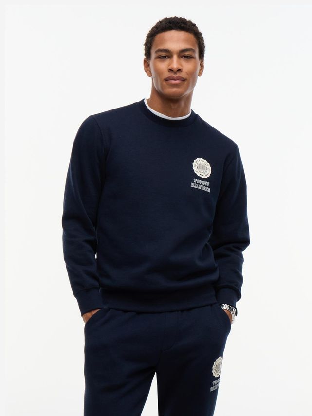Varsity Roundel Reg Fleece Crew fra Tommy Hilfiger